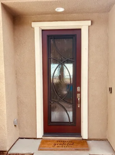 A brown door with a white frame