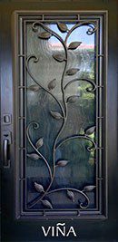 A door with a metal leaf design on it.