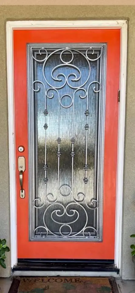 A newly painted door with glass