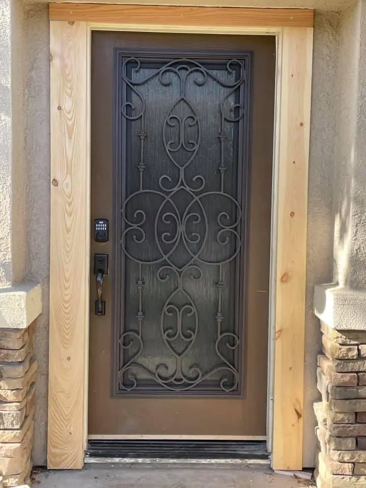A door with a metal frame and glass.