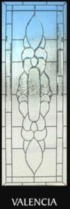 A stained glass window with a large design.