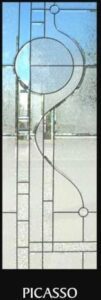 A metal ladder with a glass window in the background.
